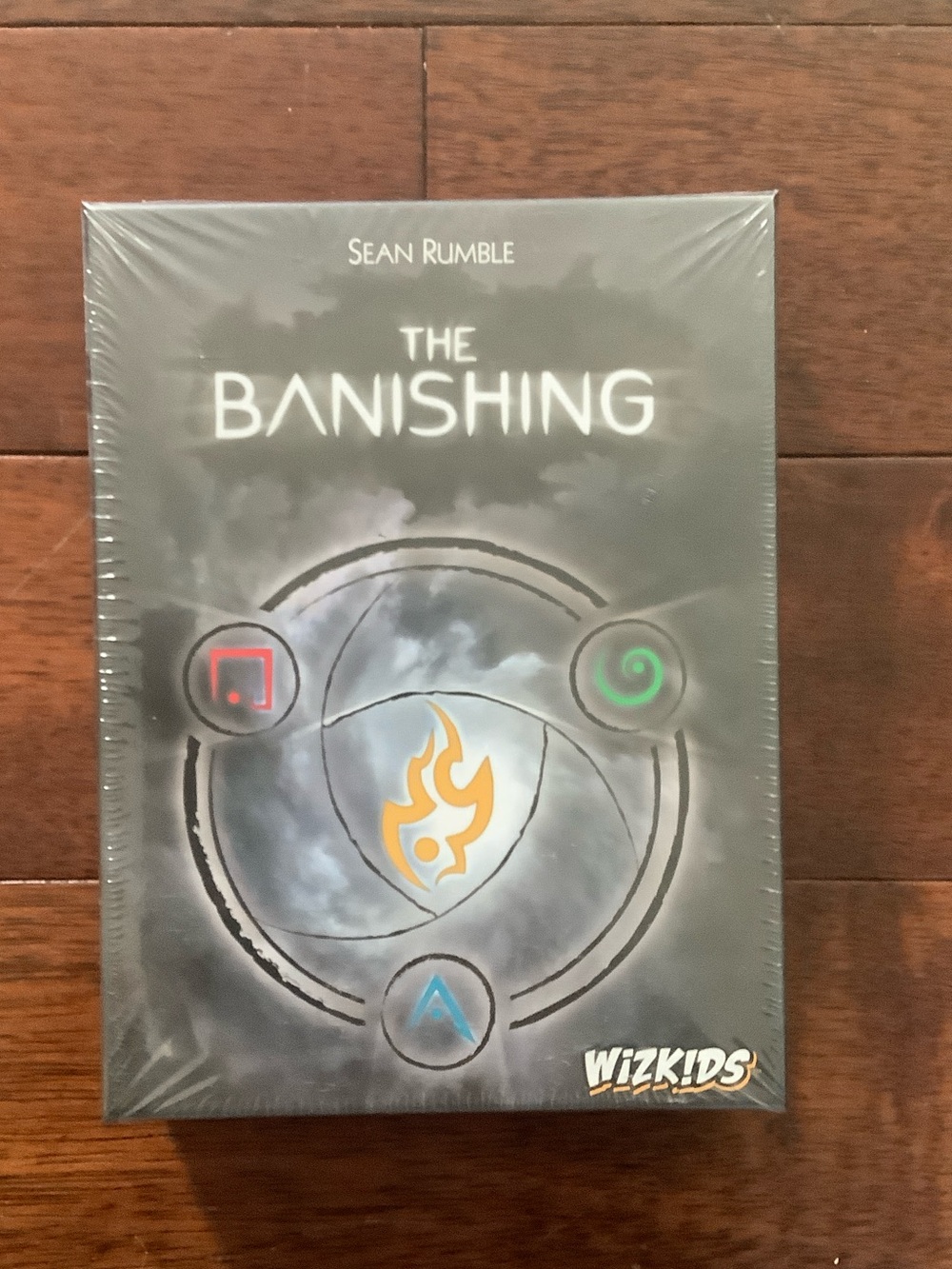 The Banishing Board Game by WizKids - Black Gray with Colored Symbols